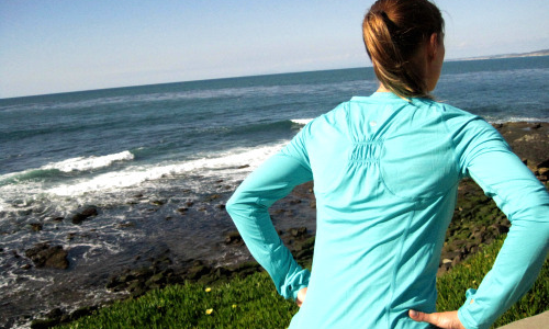 Jump inwards and outwards with your hands on your waist.