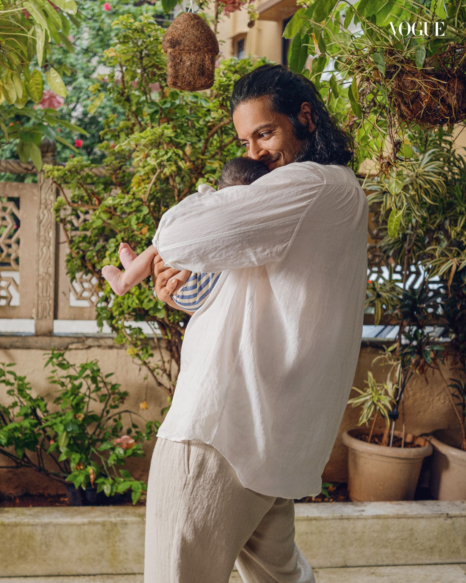 Ali Fazal: “I’ve become a little more relaxed since Zuneyra was born” 5 Image may contain Ali Fazal Adult Person Clothing Sleeve Plant Curly Hair Hair and Hugging