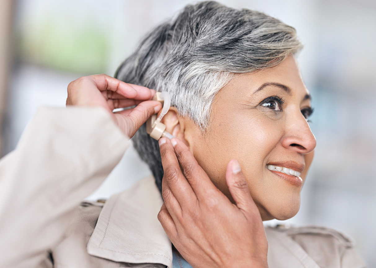 Is Hearing Loss Leaving You Lonely and Isolated? 2 Coping with Hearing Loss -- Hearing aid, medical and deaf with senior woman with a disability for healthcare, technology and sound waves. Medicine, wellness and audio with person and cochlear implant for hearing loss treatment