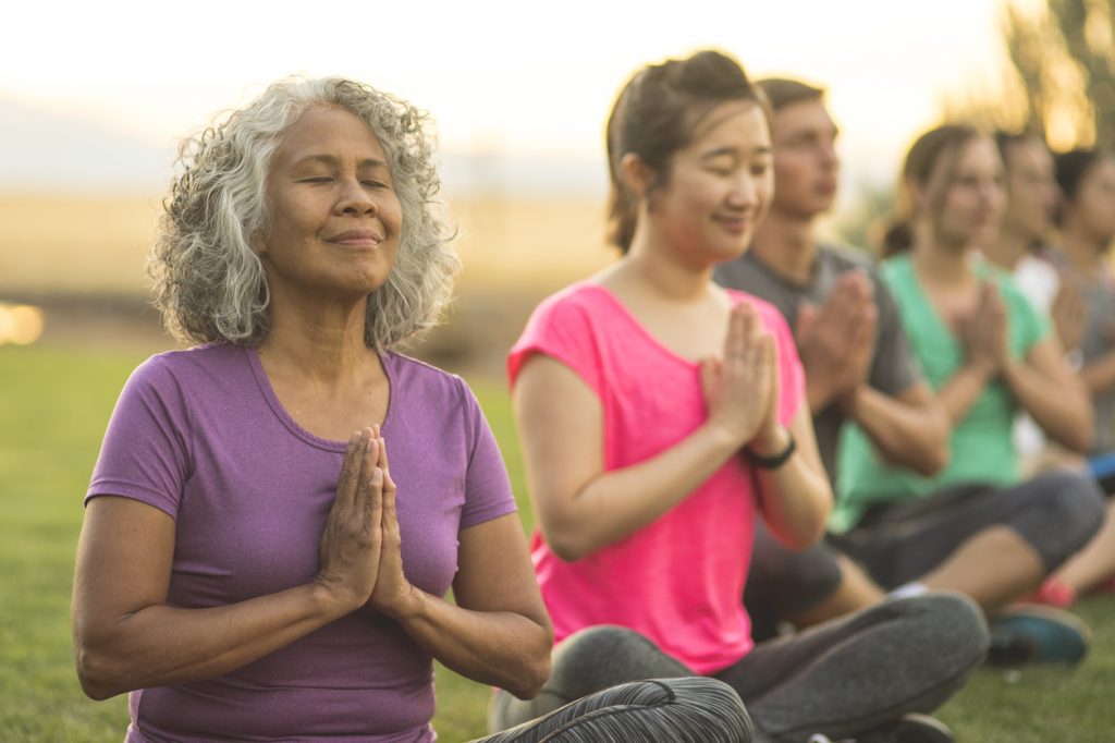 5 Tips for Ringing in the New Year With Health and Wellness 4 Group Meditation