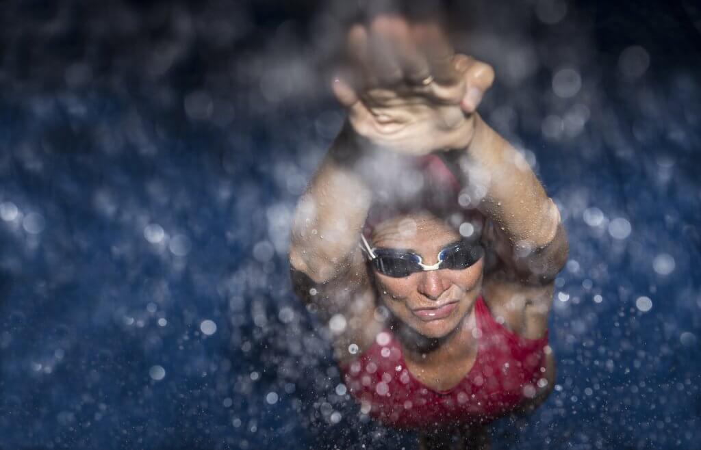 What Are the Best HIIT Workouts for Women Over 50? 3 Swim Workouts