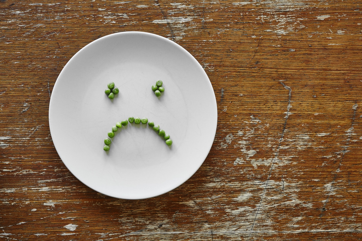 Top 3 Diet Mistakes That Will Make You Look Older 3 Peas on a plate in a sad face