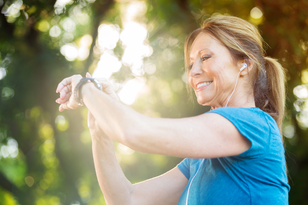 Woman Looking at Fitness Tracker