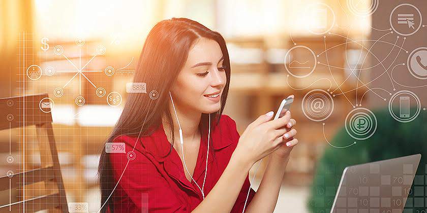 elegant woman with laptop listening music