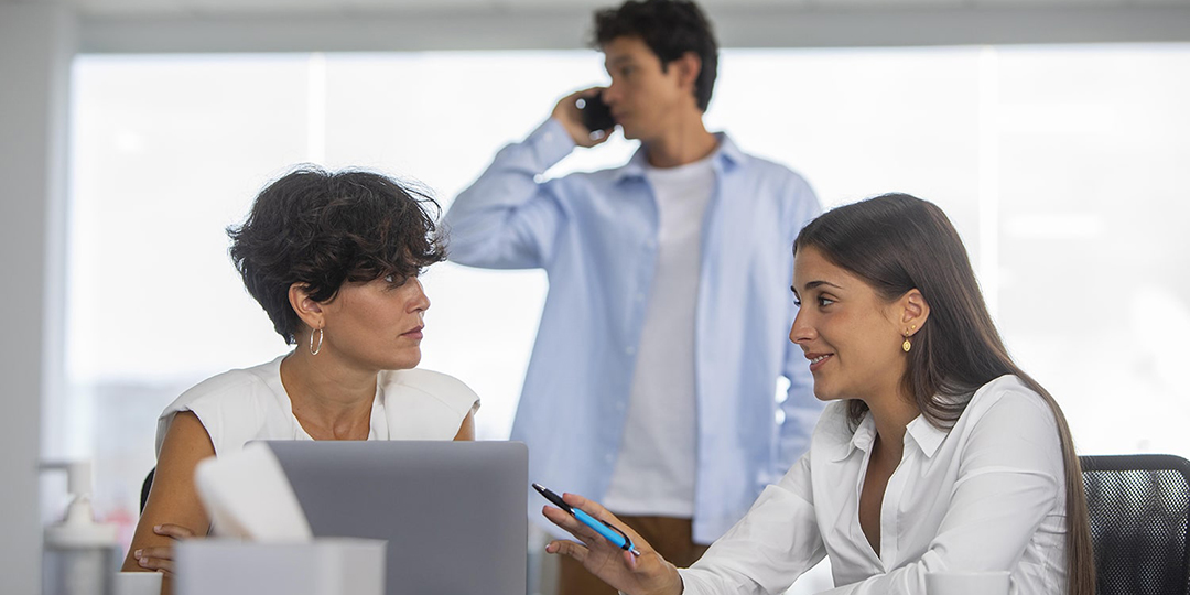medium shot business people with laptop copy